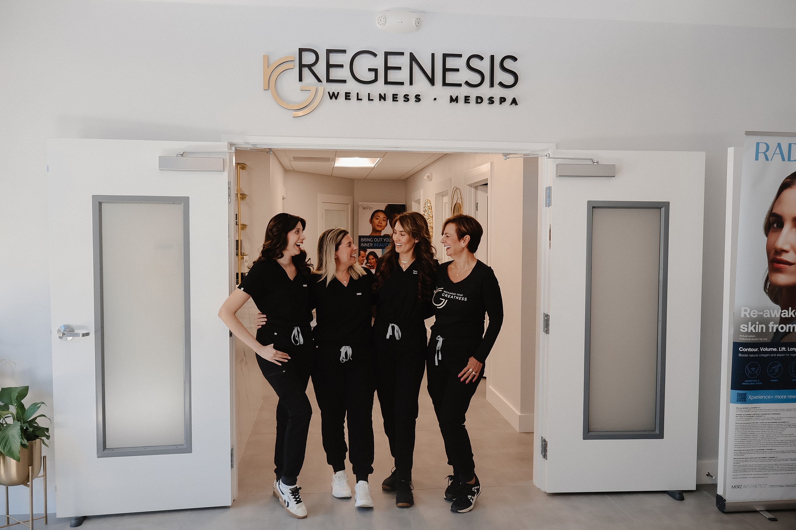 Staff at Regenesis Wellness Medspa smiling together.